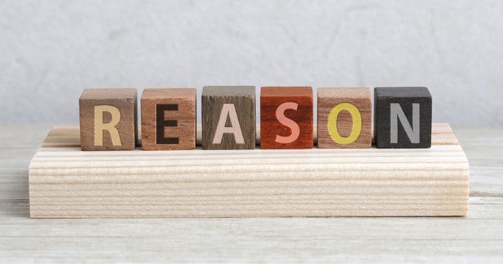 REASONと1文字ずつ書かれた積み木
